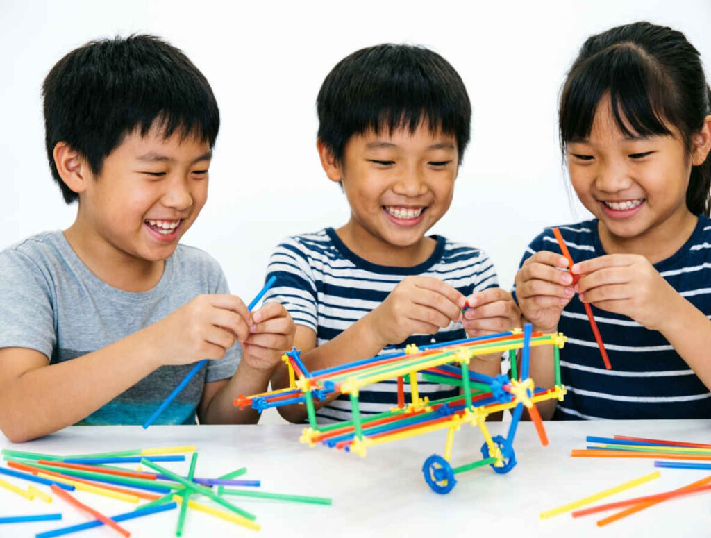children make robot with straws
